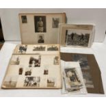 A large distressed photograph album of Naval interest with many autographs included.
