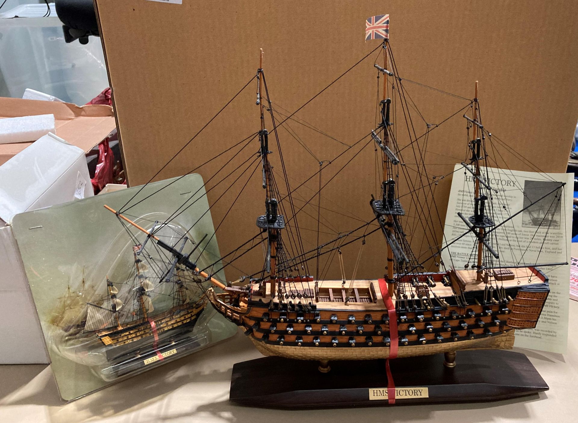 A scale model of HMS Victory on plinth (approximately 49cm long,