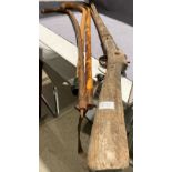 Homemade training rifle/wall piece (120cm long) and three walking sticks (Saleroom location: S2 Ent