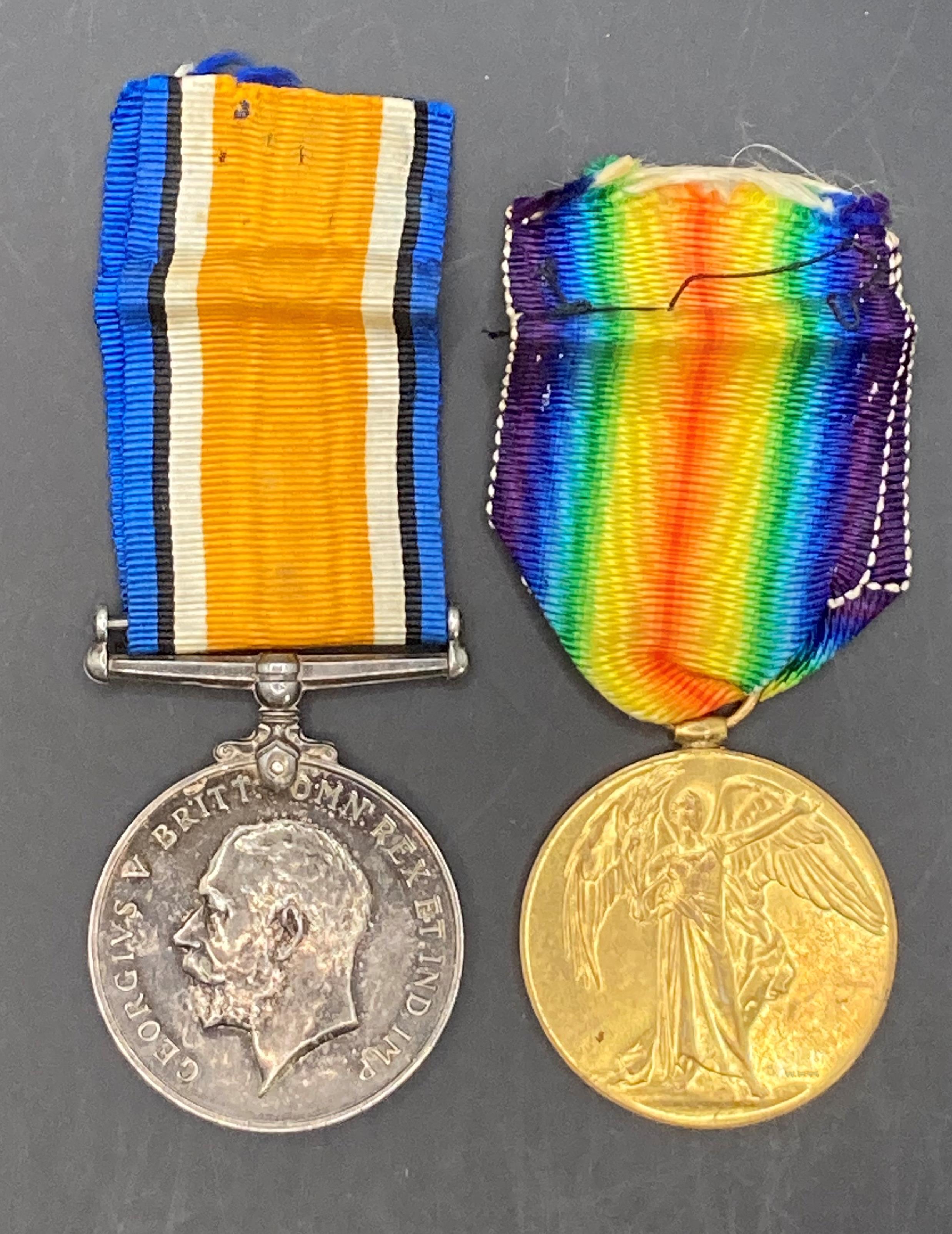 Two First World War medals - War and Victory Medals complete with ribbons to 35727 Cpl T Martin RAF