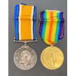 Two First World War medals - War and Victory Medals complete with ribbons to 35727 Cpl T Martin RAF