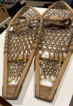 Pair of wooden snowshoes,