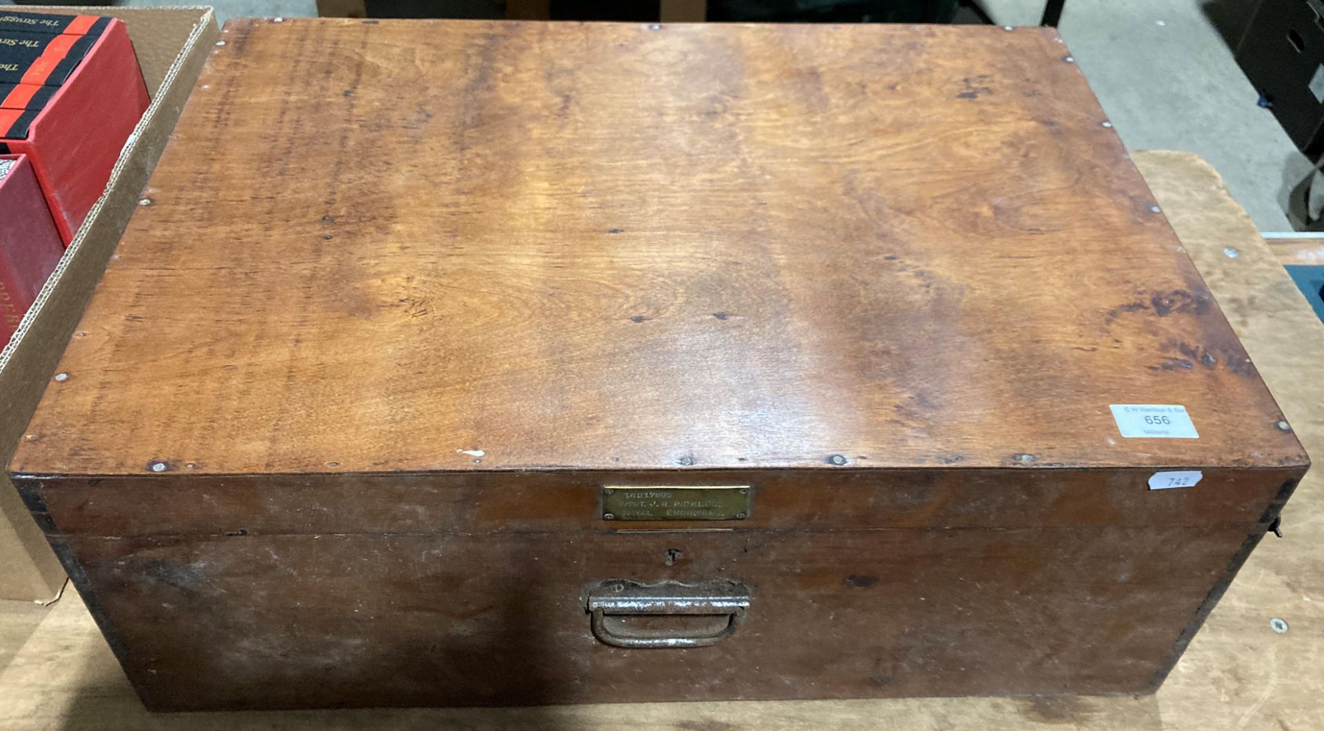 A stained pine Universal Packing Case made by The Domino Shuttle Co. Ltd.