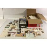 Contents to box - large quantity of stamps including souvenir covers, silk stamps, postcards, etc.