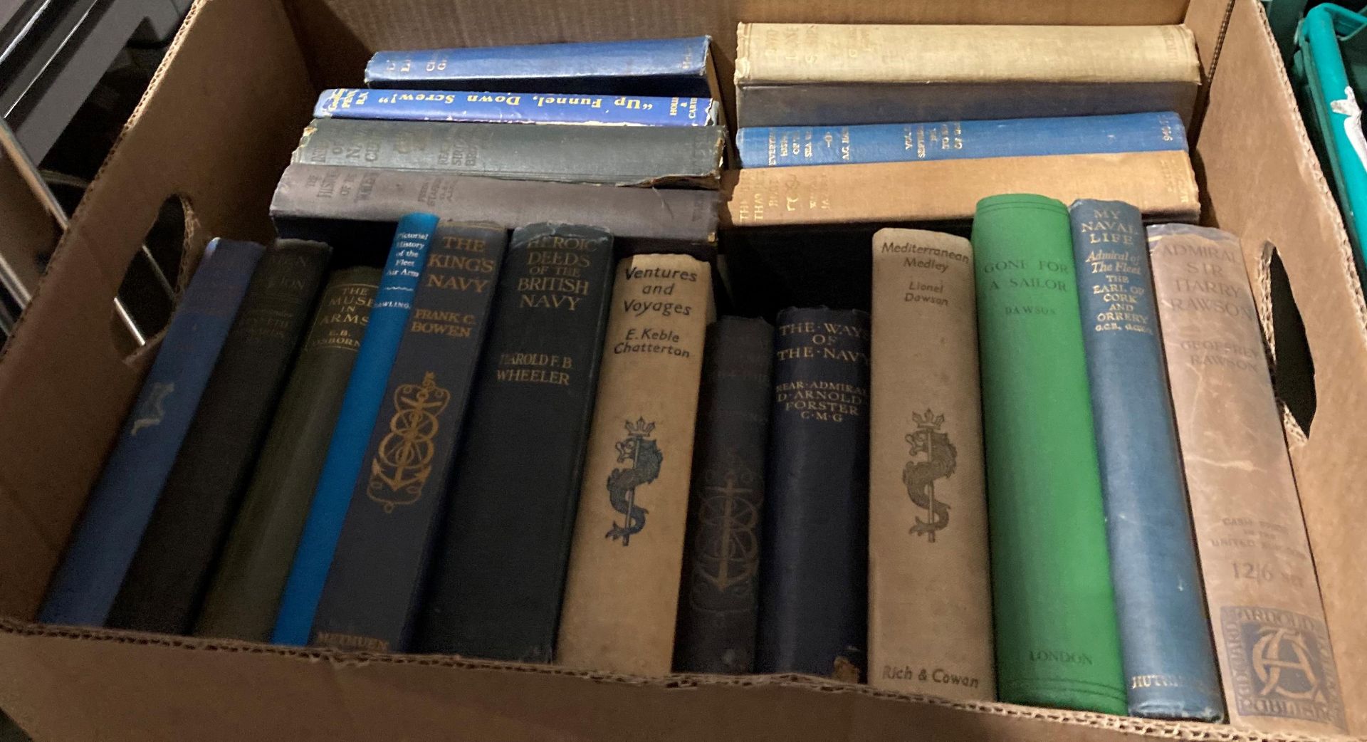 Contents to cardboard tray and blue plastic tray - 35 books and booklets - mainly naval and