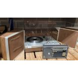 A Philips 660 stereo record deck complete with speakers and a Sony transistor radio (Saleroom