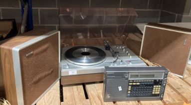 A Philips 660 stereo record deck complete with speakers and a Sony transistor radio (Saleroom