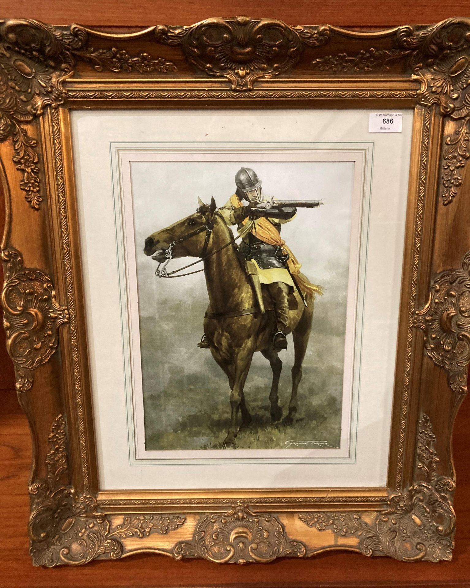 Graham Turner - an ornate gilt framed print of a mounted Roundhead musket man,
