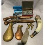 Contents to tray - two 1830 replica flintlock pistols, four assorted powder flasks including horn,