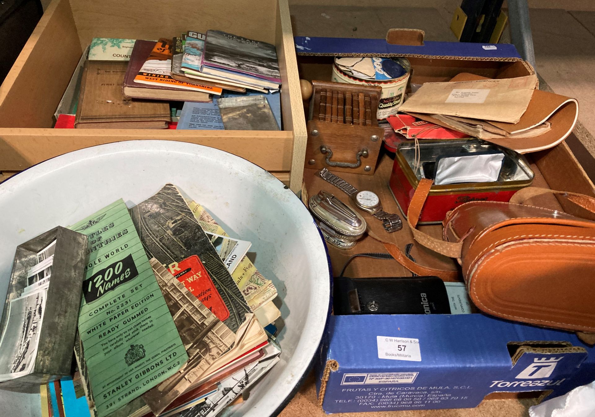 Contents to cardboard tray, drawer and white enamel basin - postcards, cigarette cards,