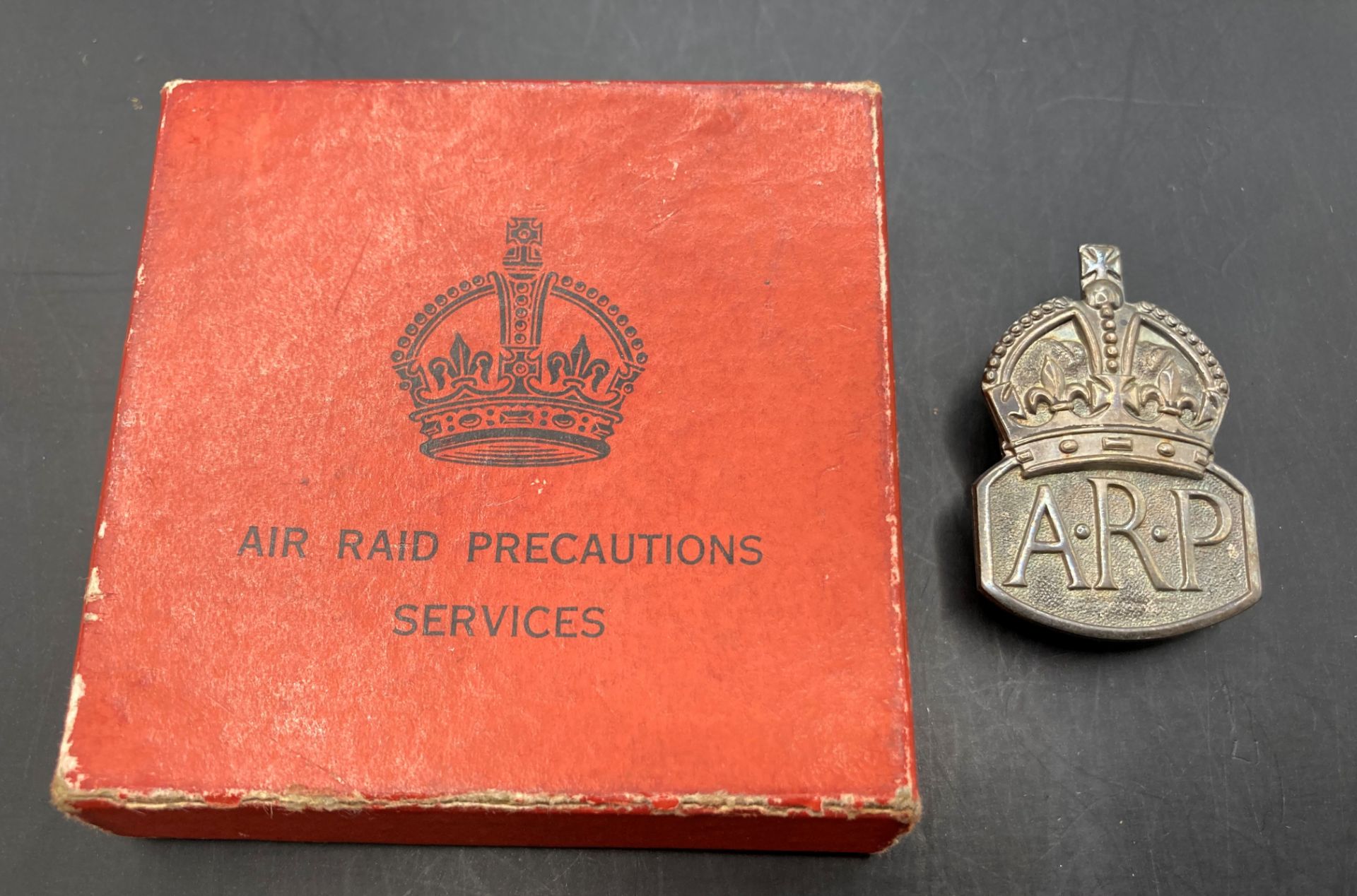 A silver ARP badge in box and a silver coloured napkin ring (2) (Saleroom location: S3 GC2) - Image 2 of 4