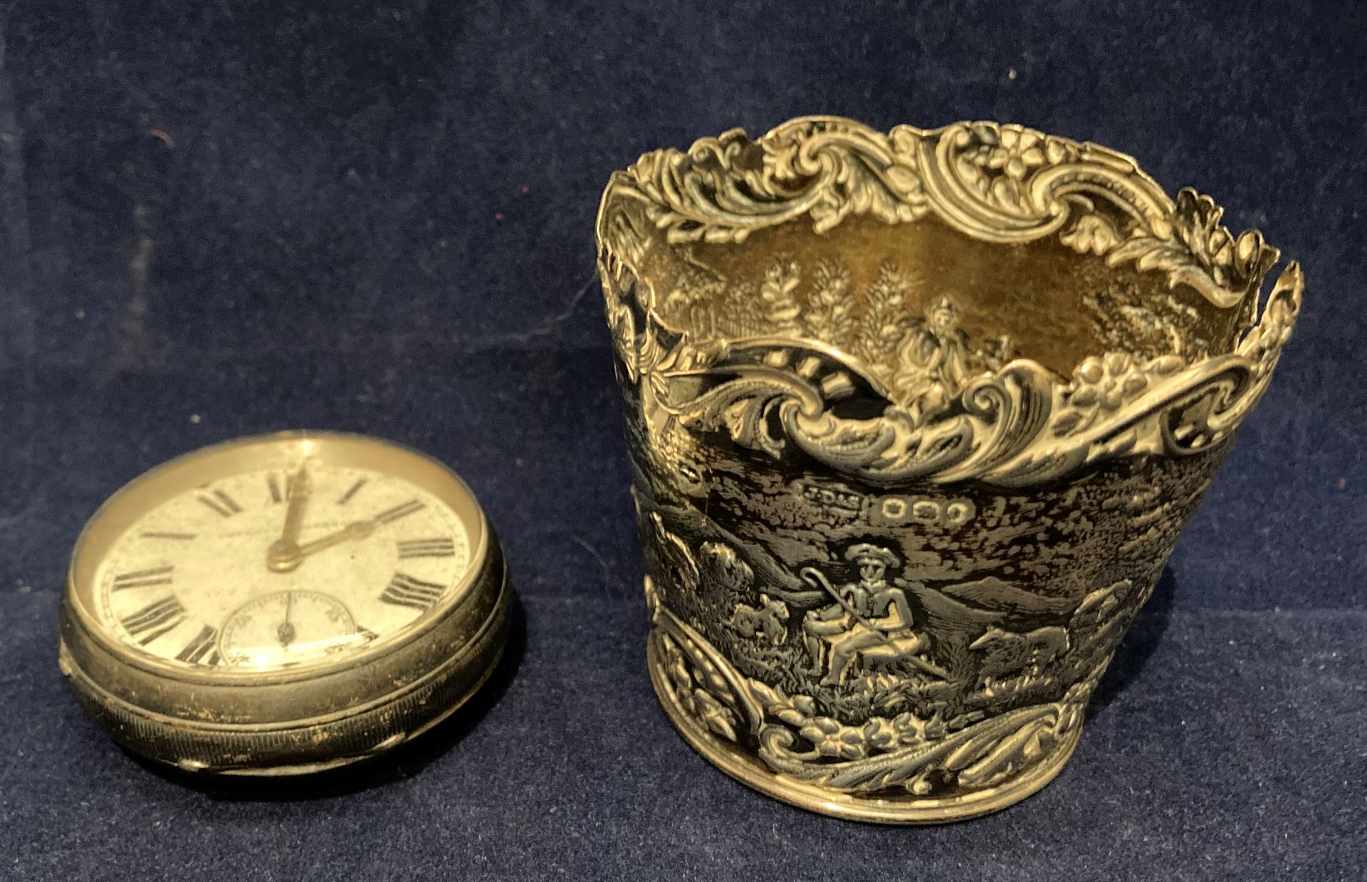 An engraved silver vessel, 6cm high, and a silver cased pocket watch, engraved to front,