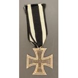 A German World War I iron cross 2nd class with ribbon (Saleroom location: S3 GC4)