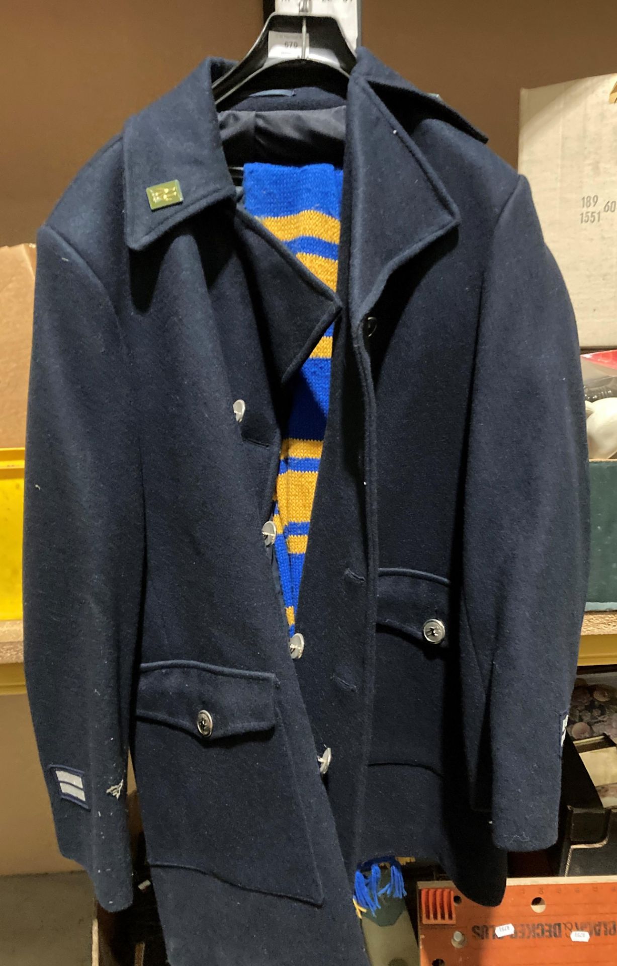 A British Rail overcoat in blue by Del Guerra Ltd, S.