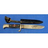 A Nazi Germany dagger in sheaf, length 25cm, length of blade 15cm,