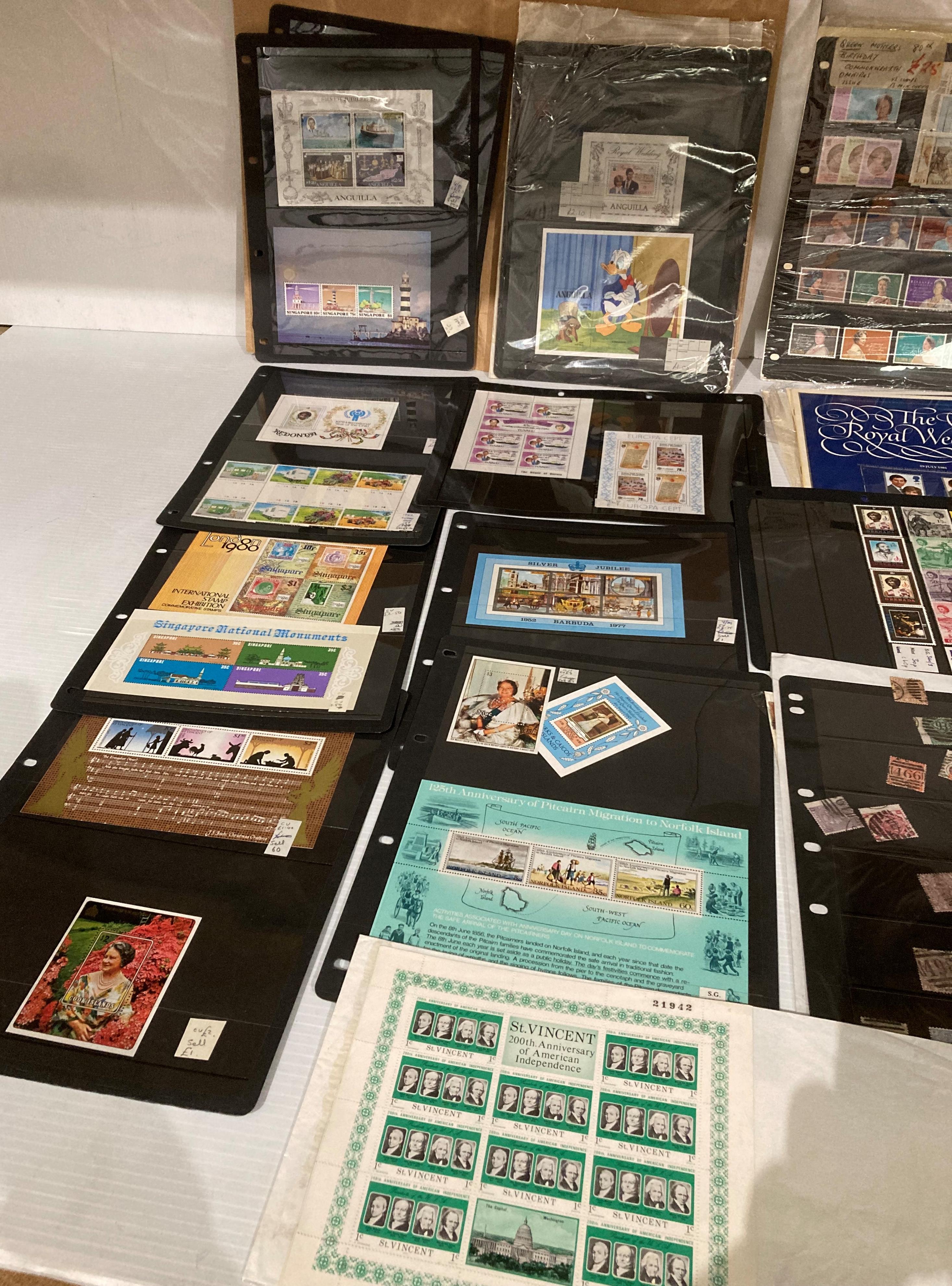 Contents to box - large quantity of mounted stamp sheets and commemorative stamps (Saleroom - Image 2 of 4