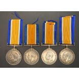 Four World War I War Medals with ribbons to 77032 Gnr B Green R A,