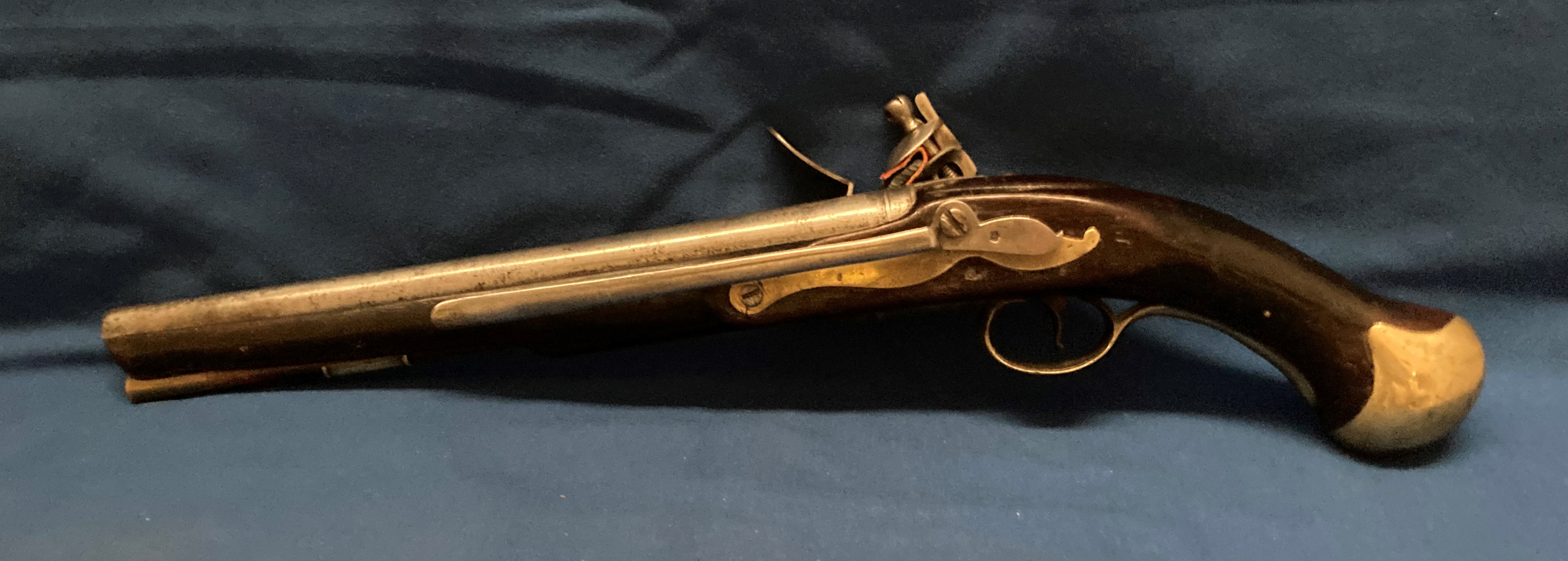 An 18th century Long Sea Service pistol, the lock marked TOWER and crown over GR,