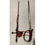 Two assorted decorative swords - a 75cm blade and a 70cm blade with brown leather finish sheath -