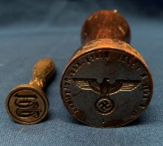 A wood handled stamp for 'Nazi' Heligoland and a brass seal,