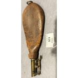 A leather and brass gun powder flask,
