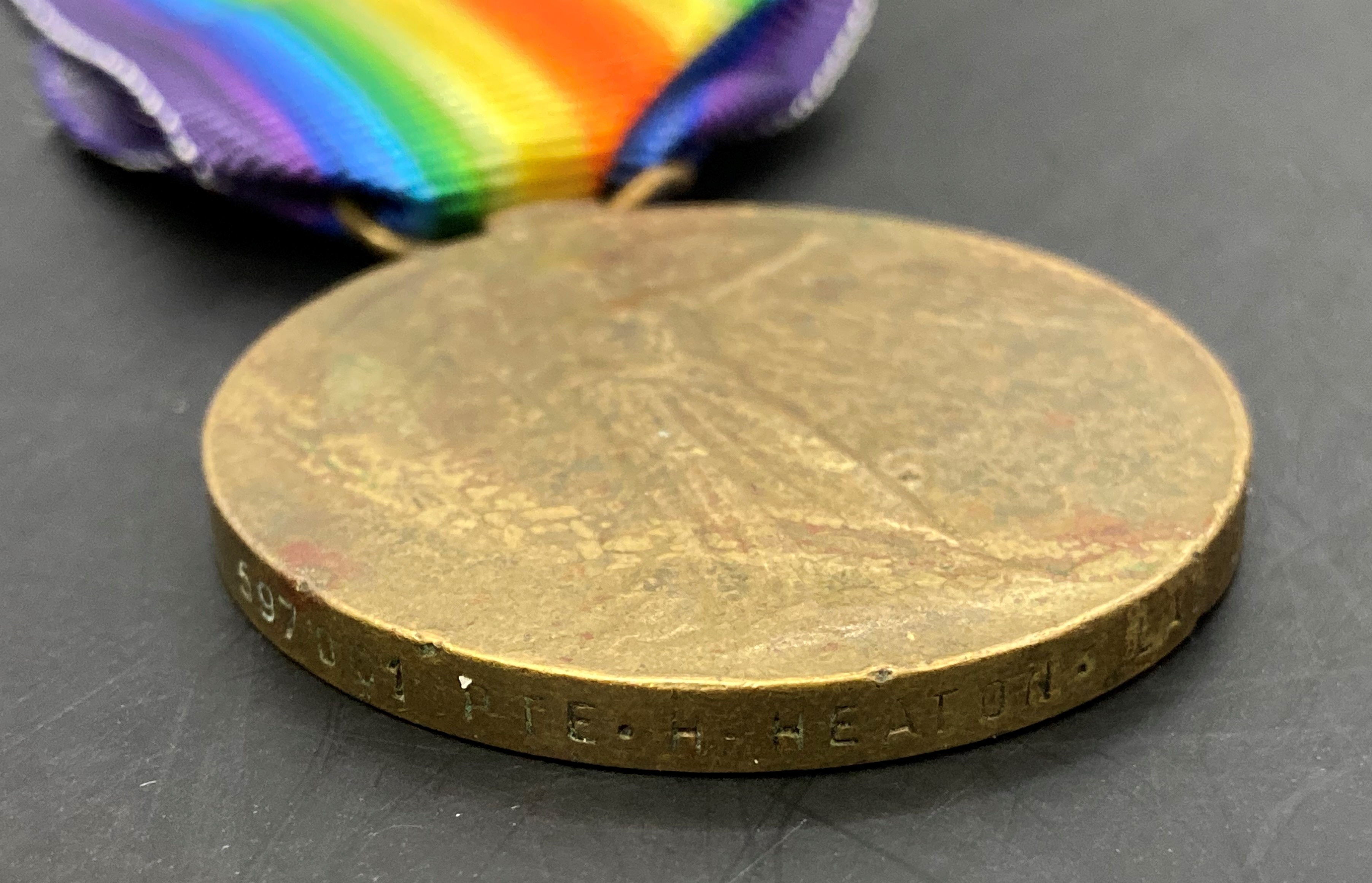 Three First World War Victory medals with ribbons to 1399 Gnr T Lloyd RA, - Image 4 of 4