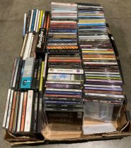 Contents to crate - approximately 120 assorted music CDs including artists - Paul Weller,