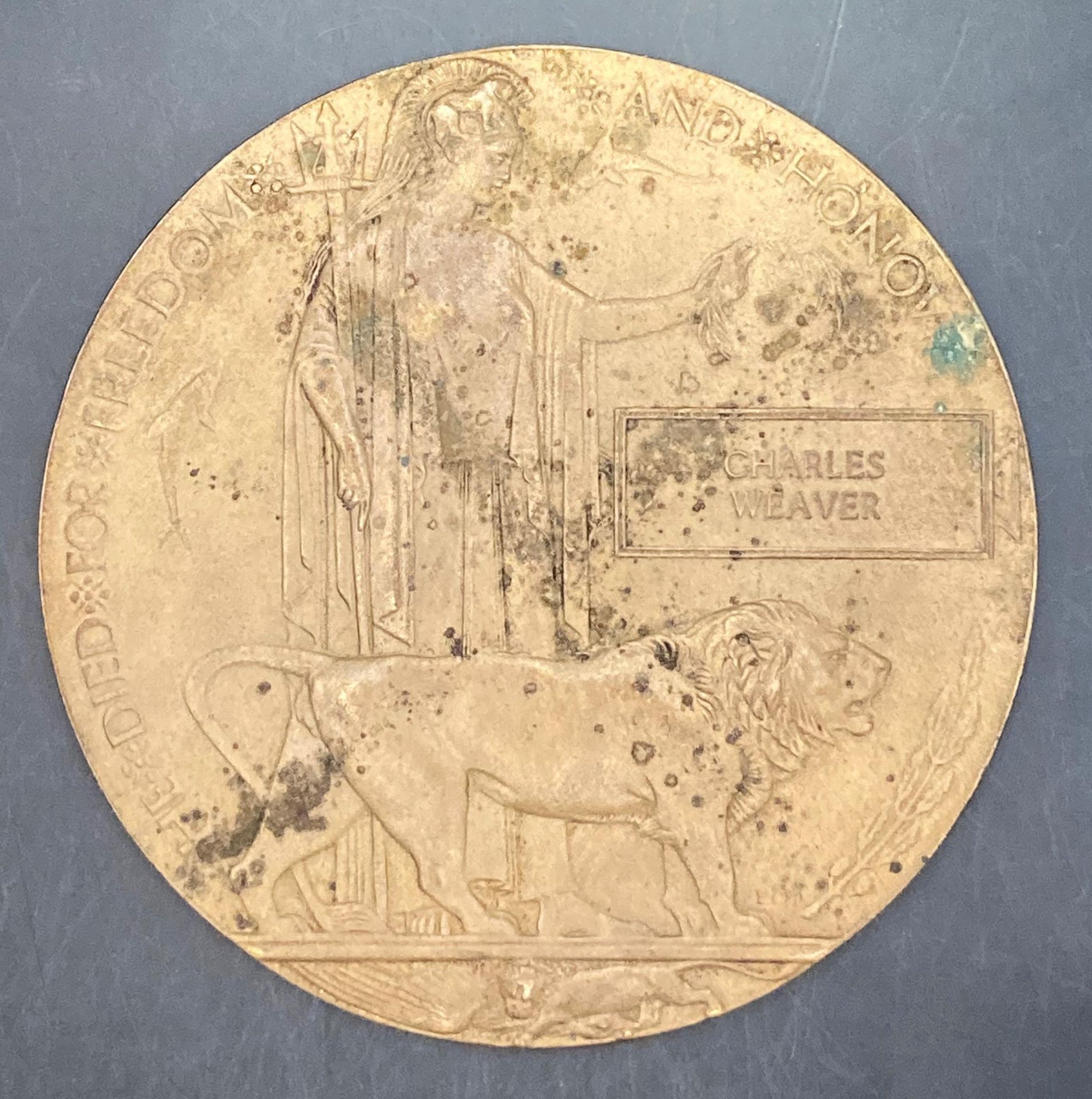 A bronze Death plaque awarded to Charles Weaver,