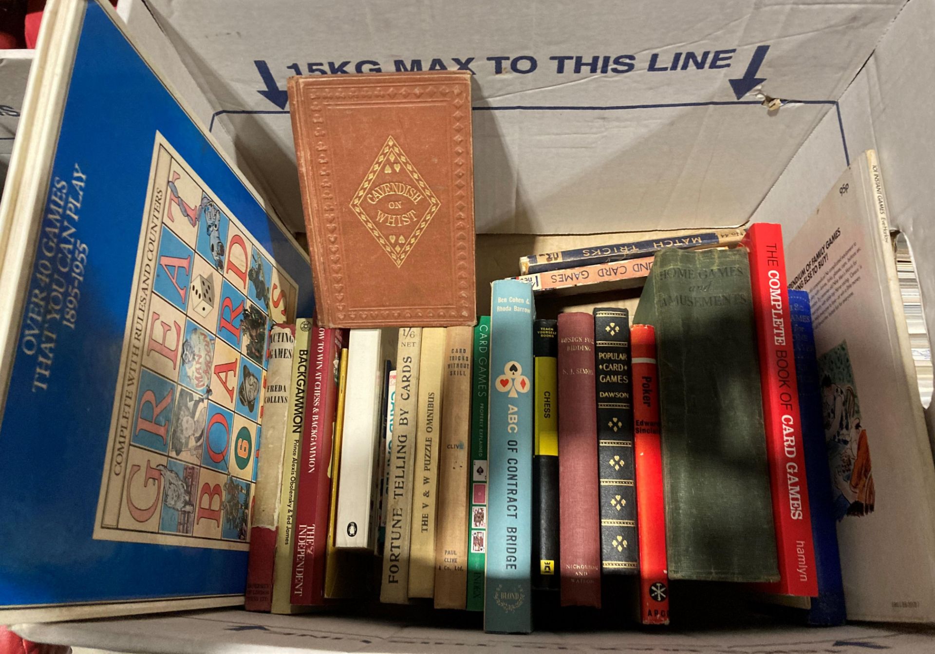 Contents to box - a quantity of vintage and modern books on home games and amusements - bridge,