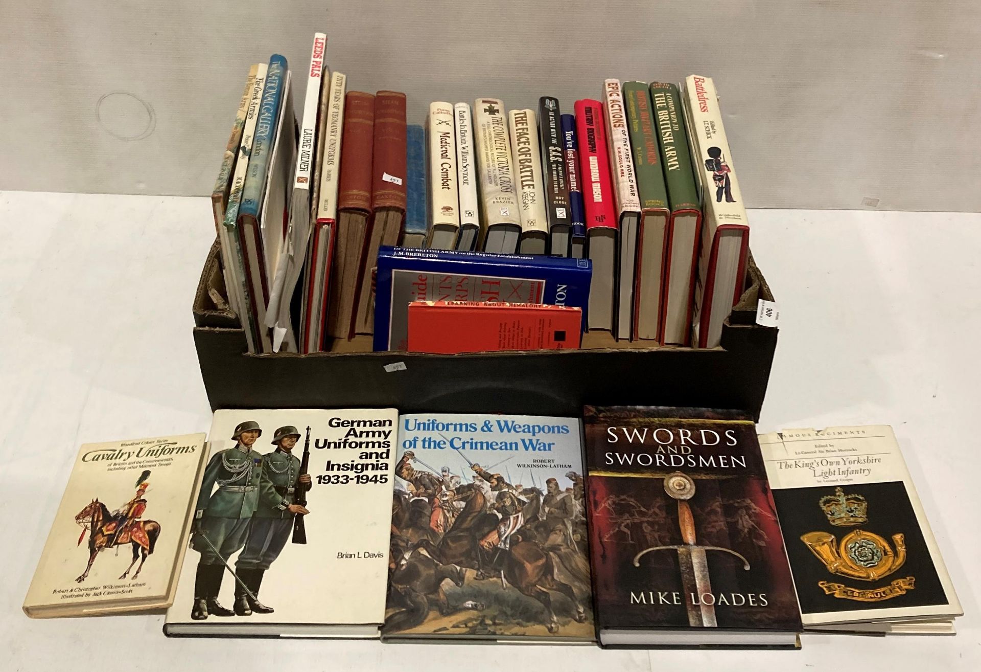 Box containing thirty books and booklets (mainly militaria themed) including two volumes of Caxton