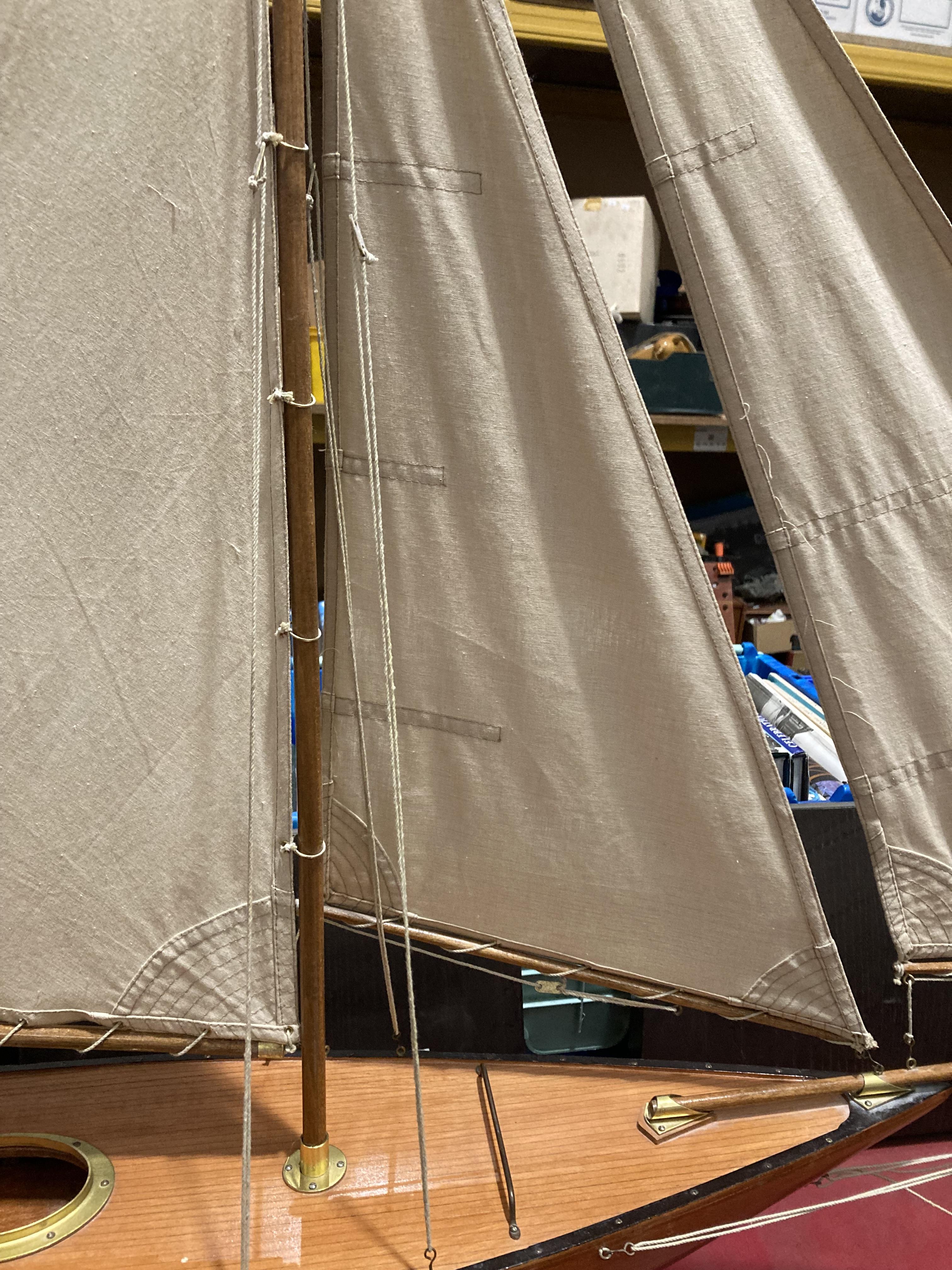 A large handmade pond yacht with three sails on a mahogany stand, hull size 90cm, - Image 6 of 6