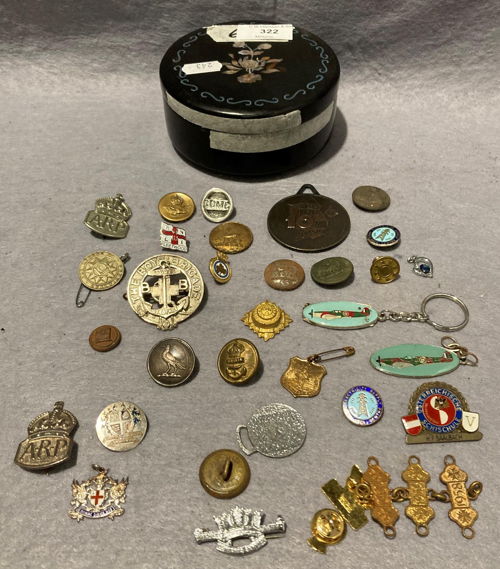 Contents to black mother of pearl inlaid box - assorted military buttons,