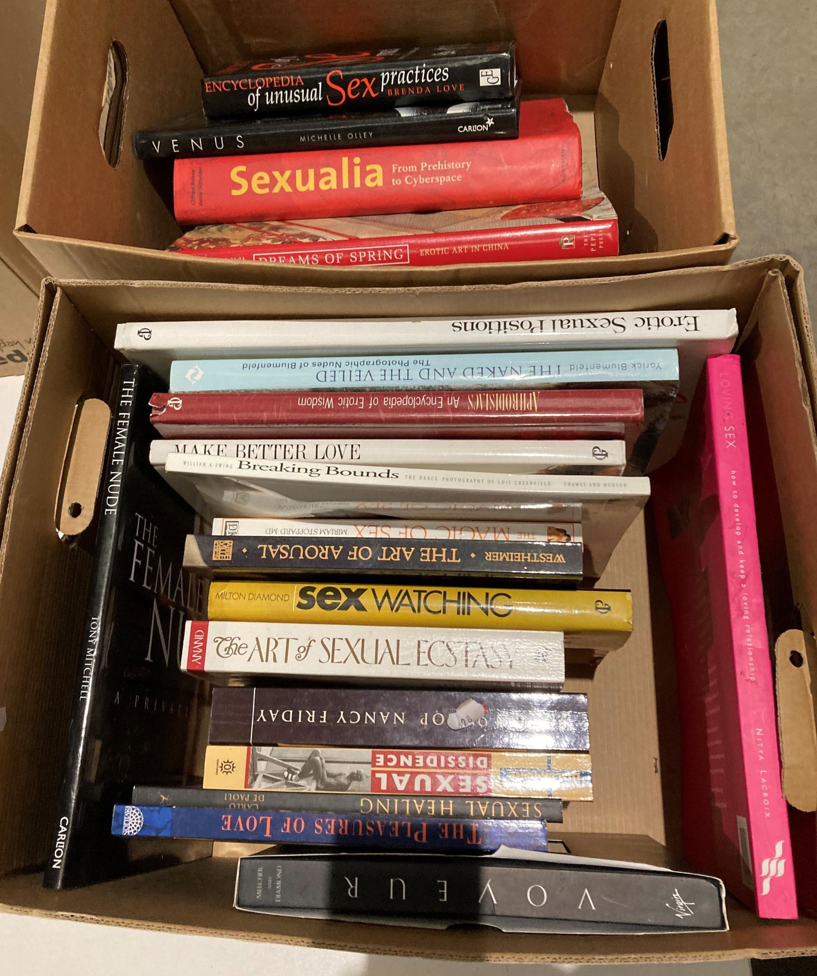 Contents to two boxes - approximately 23 assorted books on 'The Pleasure of love', 'Magic of Sex',