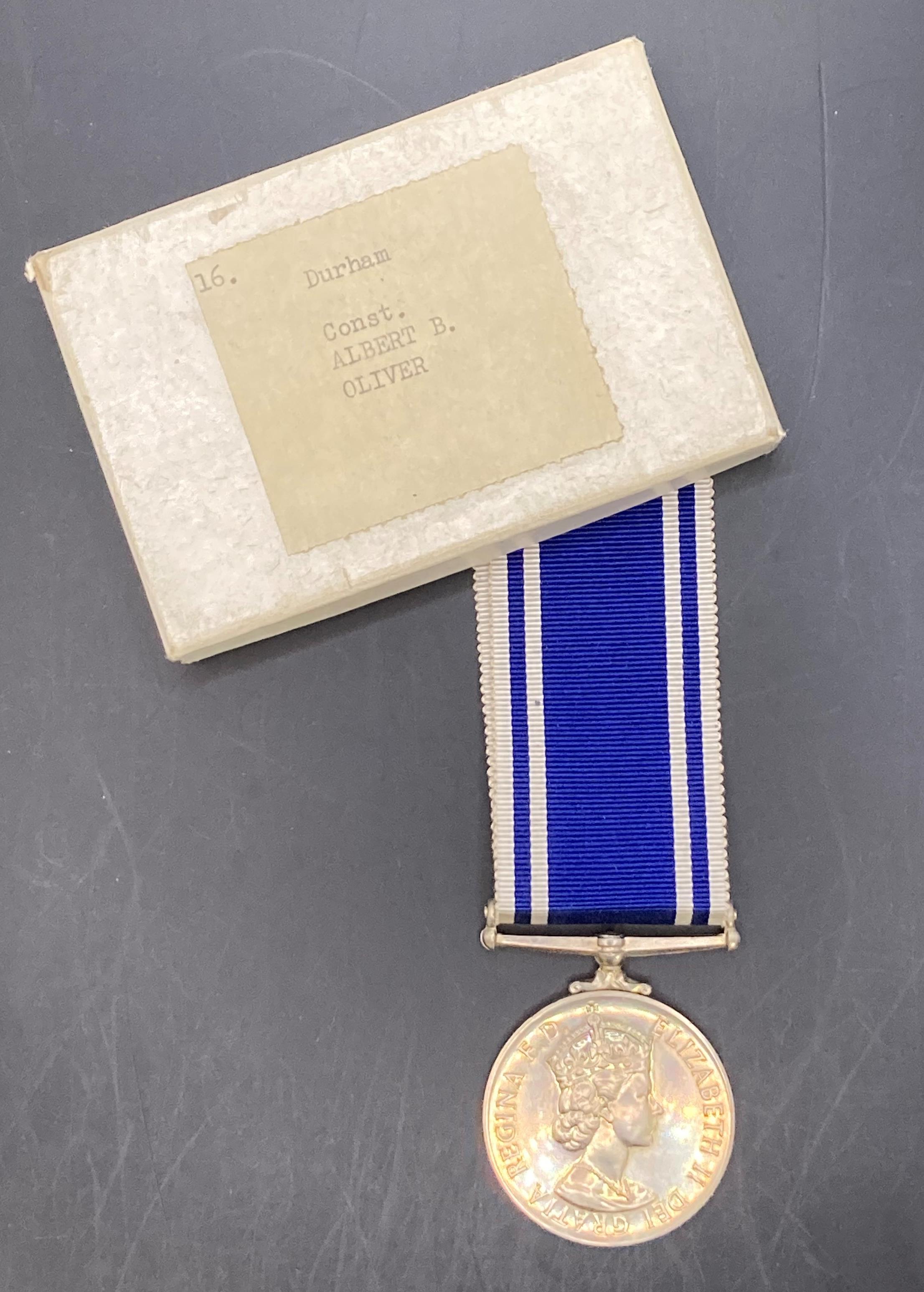 Police Exemplary Service Medal (Queen Elizabeth II) complete with ribbon and in box of issue to