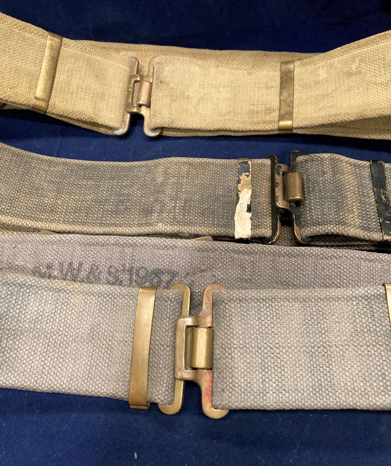 Two World War II British Army 37 pattern belts (one khaki and one grey) and a belt/utility strap - Image 2 of 3