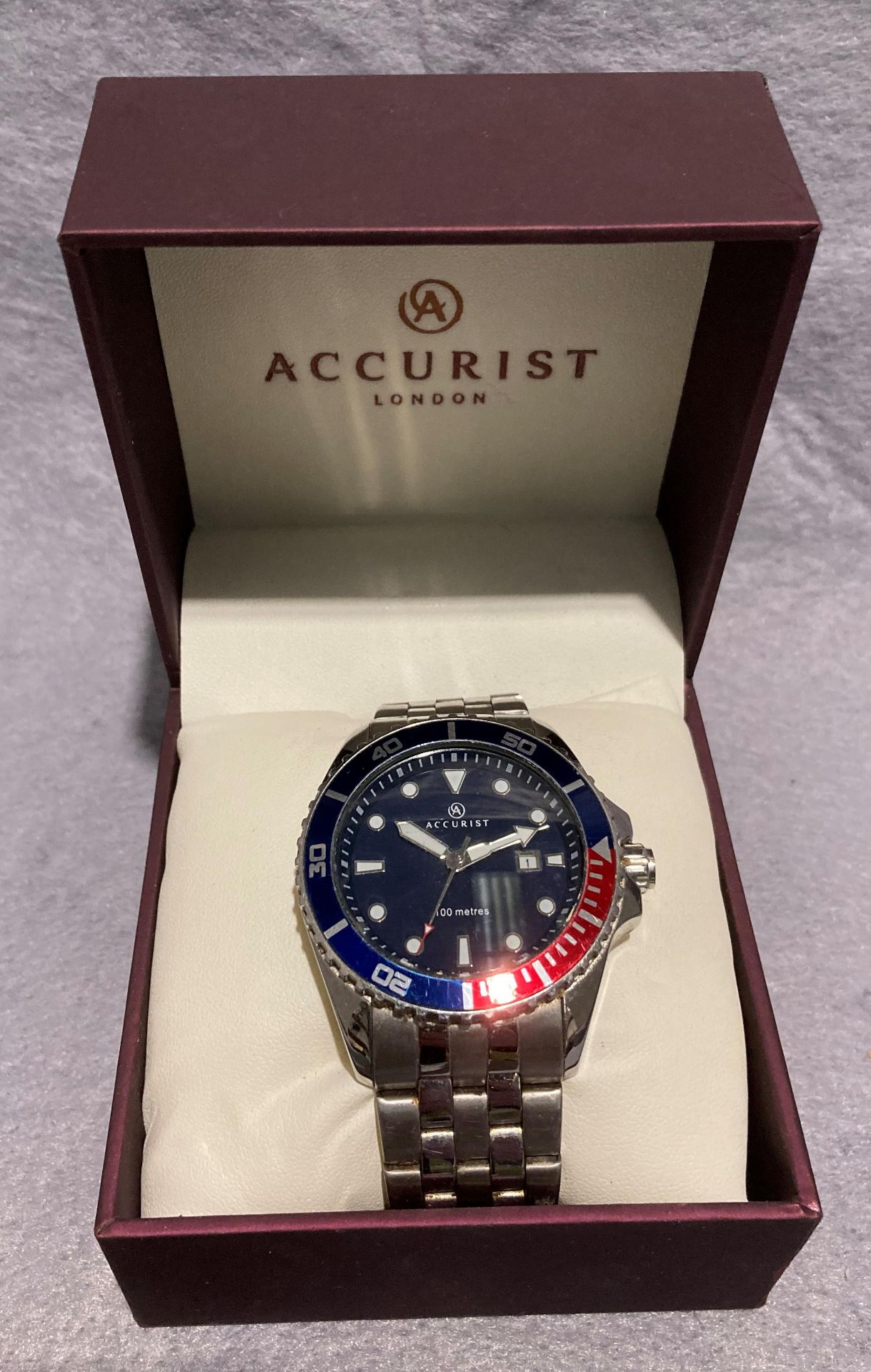 Accurist 100m 7201 watch with blue dial and rotating bezel in box (Saleroom location: S2 Rostrum