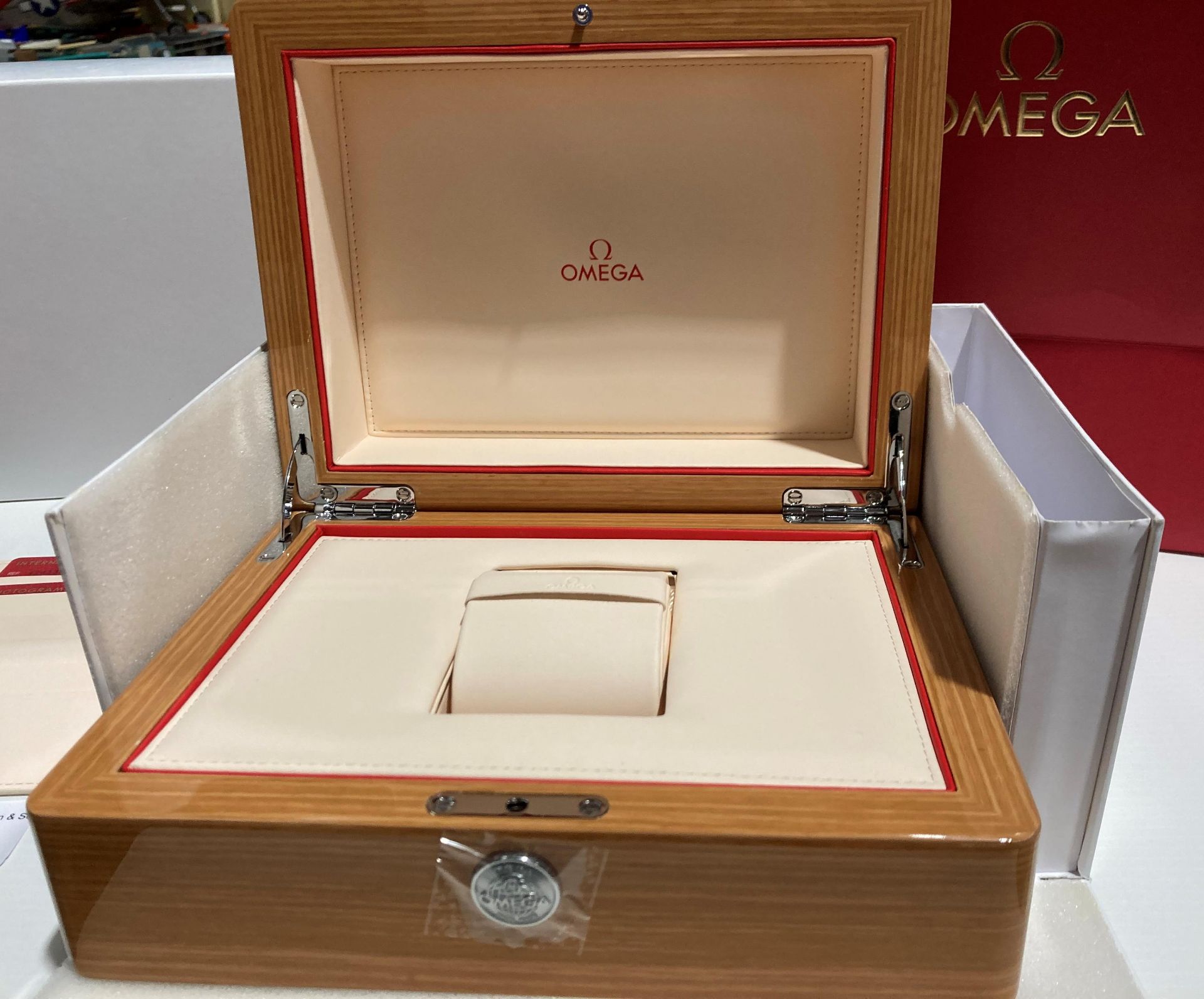 Omega polished wood-effect watch box in white outer protective case with operating instructions - Image 2 of 4