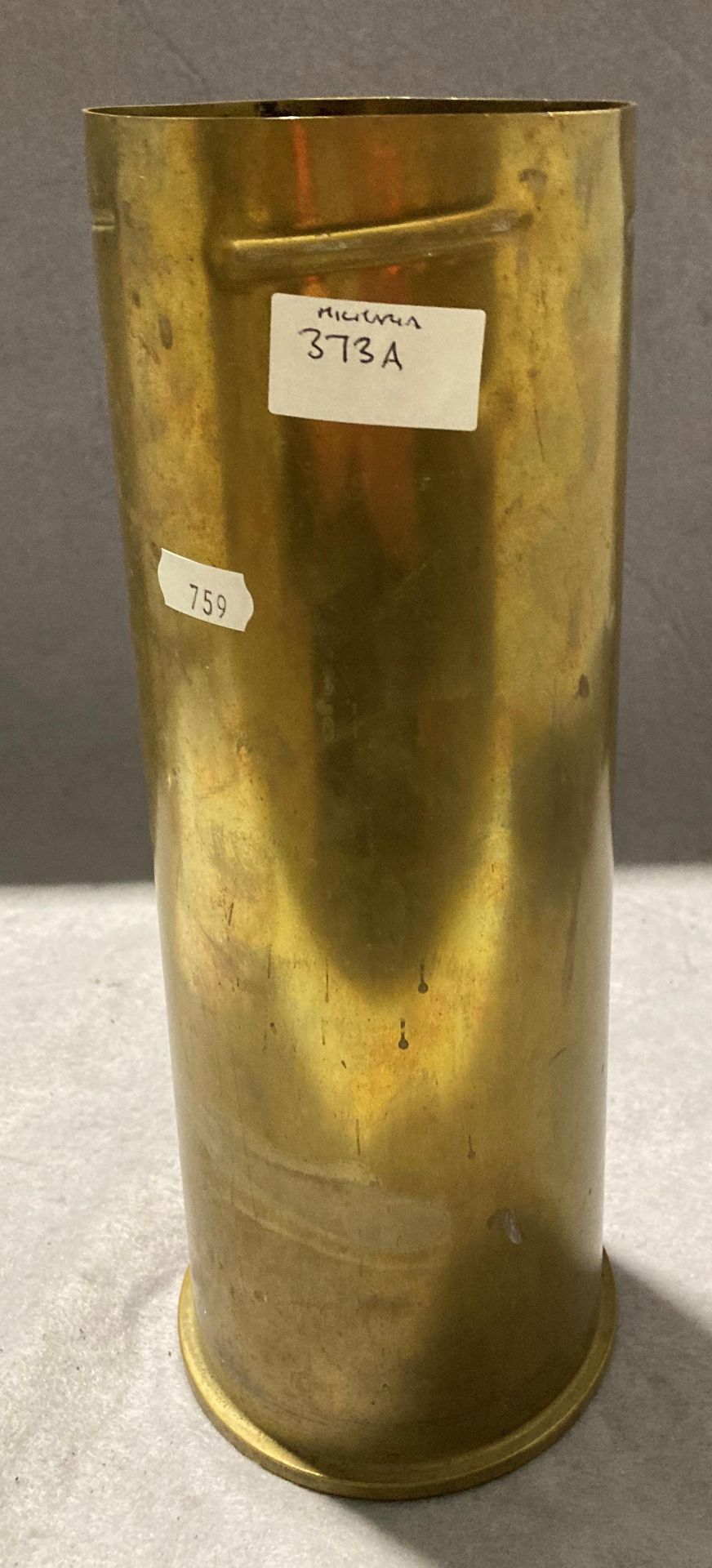 Brass shell case (32.