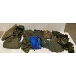15 assorted military clothing items including kit bag combat DPM trousers (76/96/112) and smock