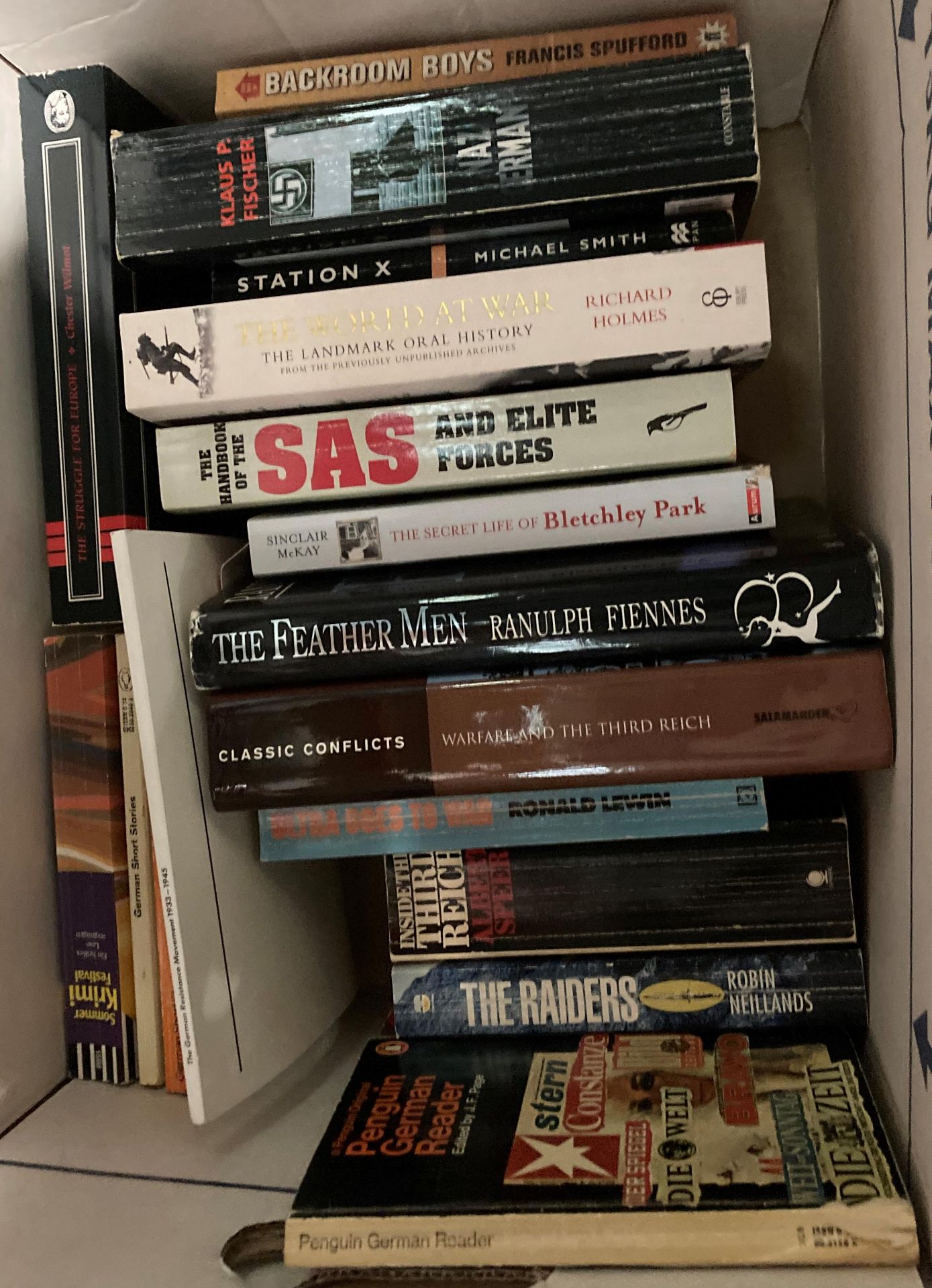 Contents to two boxes and a lid - a quantity of books mainly related to the Second World War and