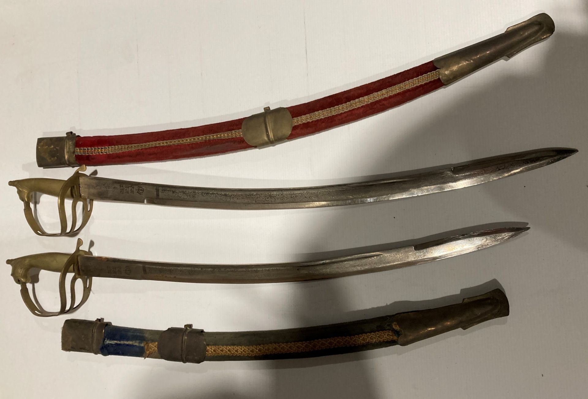 Two assorted Indian made replica military sabre swords and scabbards with brass handles (Saleroom - Image 3 of 3