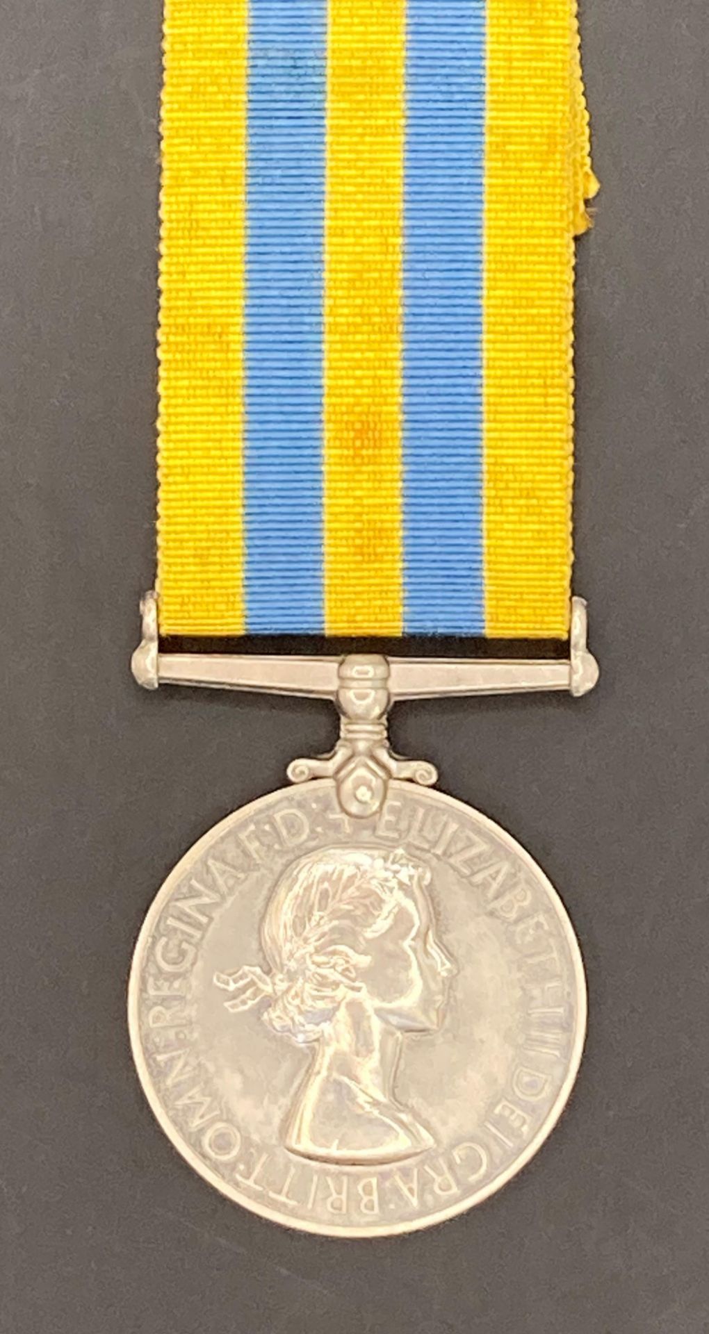 A Queens Korea medal and ribbon to 22463270 Pte. R Hatcher, the Welsh Regiment, wounded 24.5.