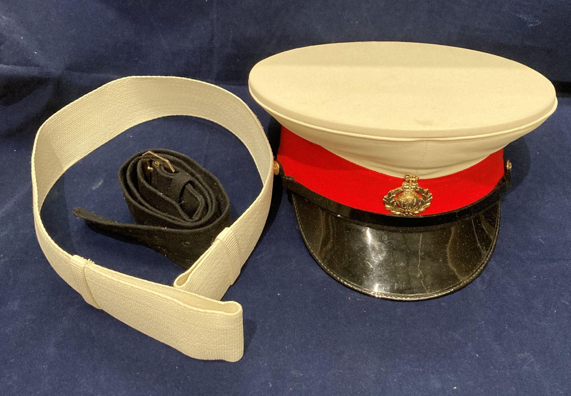 A Royal Marines peaked dress cap,