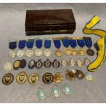 Brown Bakelite box and thirty assorted medals/awards for dancing,