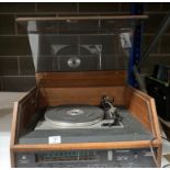 A Dynatron stereo radio with Garrard SP25 Mk IV record deck (flex cut off,