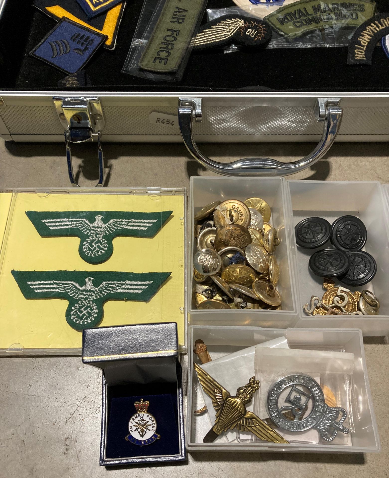 Aluminium case and contents - military and civil defence related badges, cap badges, buttons, - Image 2 of 5