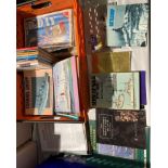 Contents to orange crate - booklets, magazines,