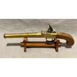 Antique Queen Anne style brass cannon barrel flint lock box lock pistol with double stamp to barrel