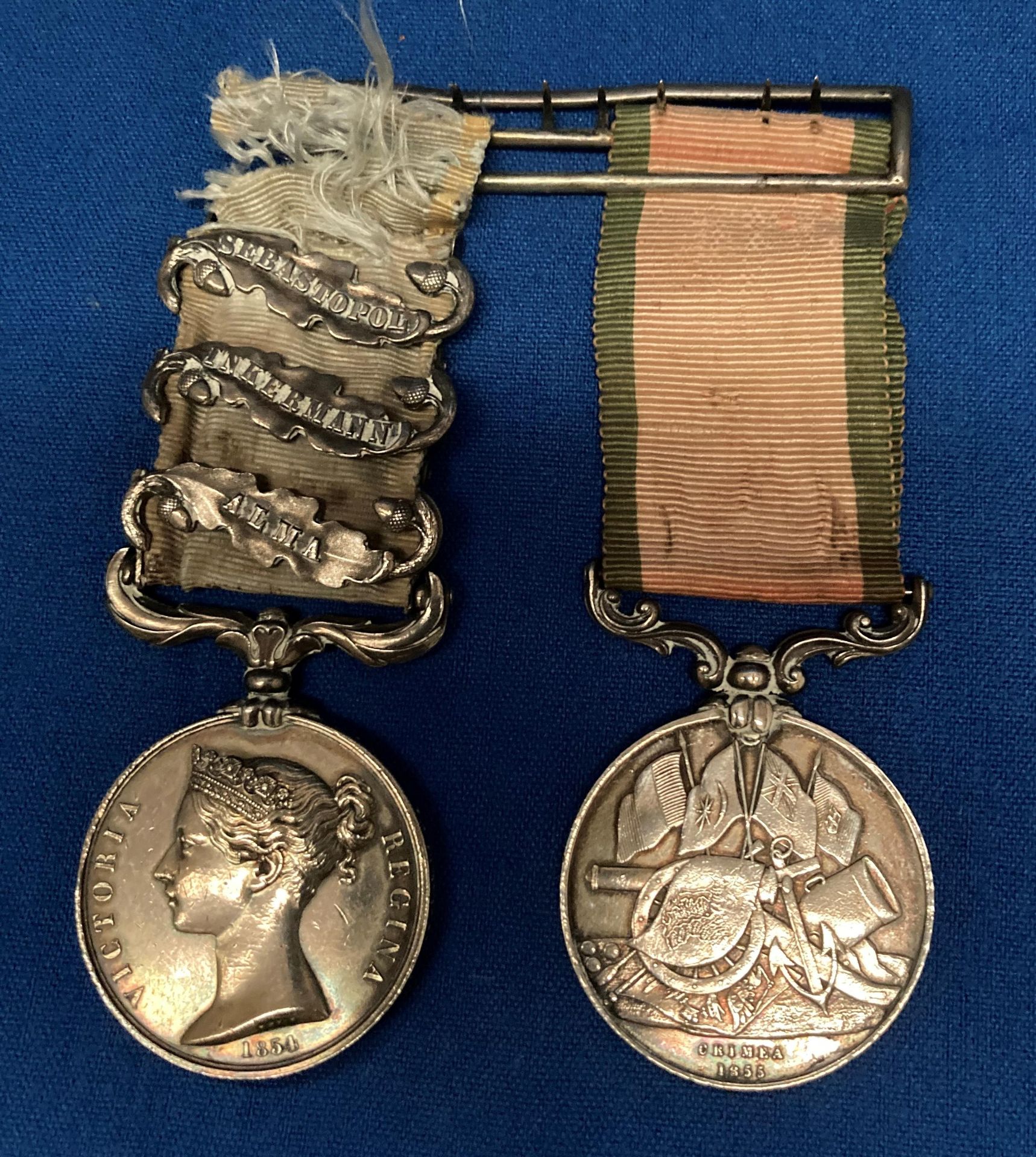 CRIMEA MEDAL 1854-56, no ribbon but three clasps, Sebastopol, Inkerman and Alma, engraved to Qr.