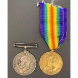 Two First World War medals - War Medal and Victory Medal complete with ribbon to 50938 Pte F W